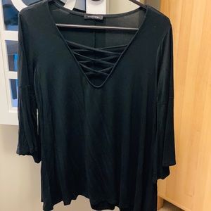 Crisscross three-quarter bell sleeve shirt